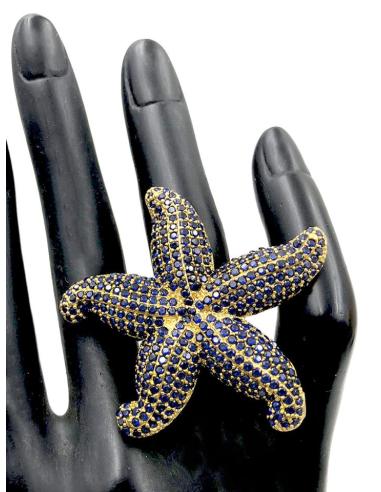 ANILLOS AZULES DE ESTRELLA DE MAR DECORADA CON PEDRERIA