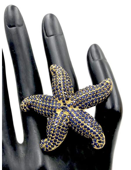 ANILLOS AZULES DE ESTRELLA DE MAR DECORADA CON PEDRERIA