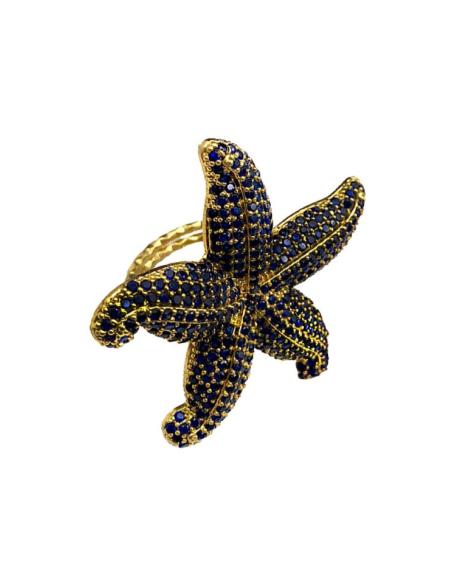 ANILLOS AZULES DE ESTRELLA DE MAR DECORADA CON PEDRERIA