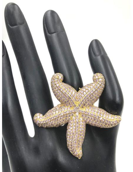 ANILLOS ROSAS DE ESTRELLA DE MAR DECORADA CON PEDRERIA